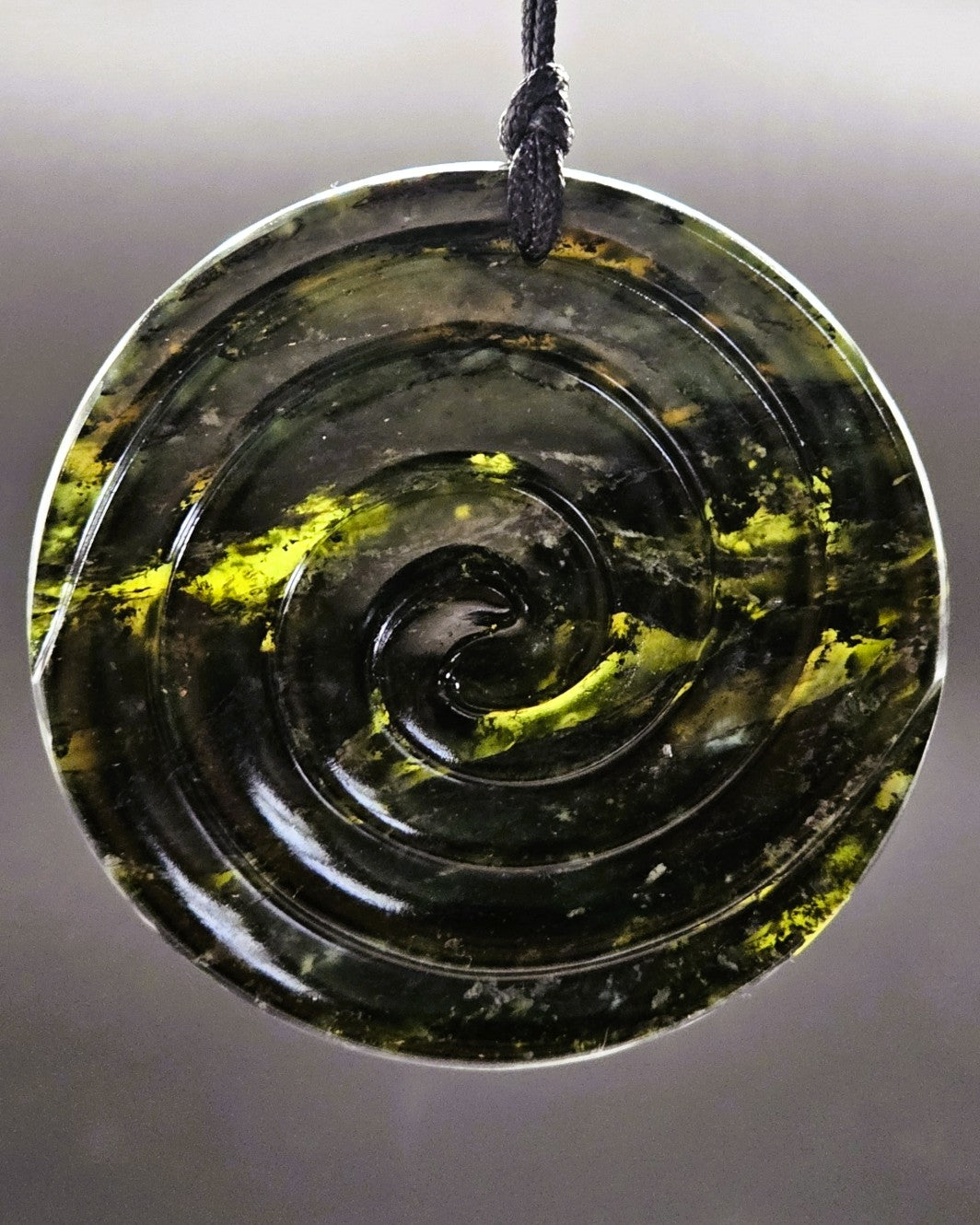 Disc with Double Koru
