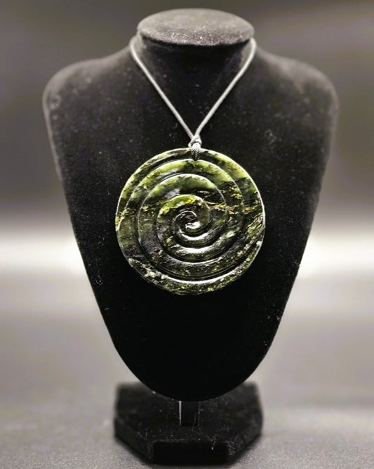Disc with Double Koru